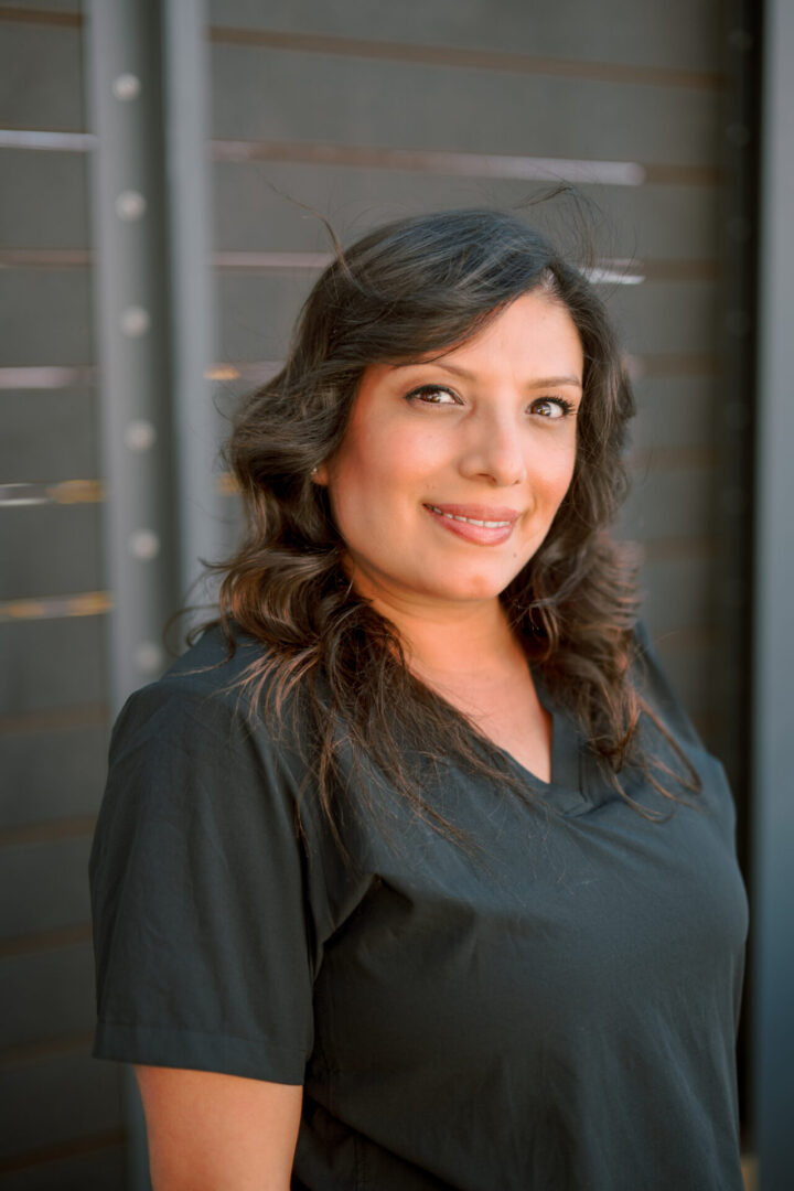 Smiling woman in a black shirt