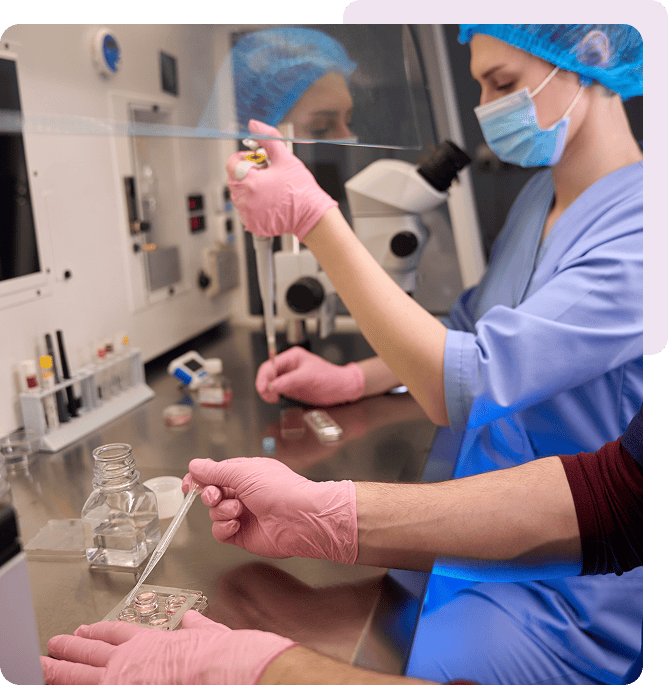 Scientist handling equipment in a sterile lab
